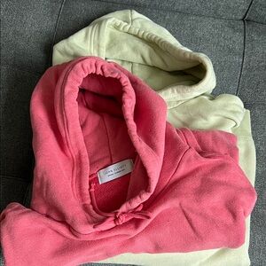 John Elliott summer hoodies. One raspberry and one mint. Sold as set.